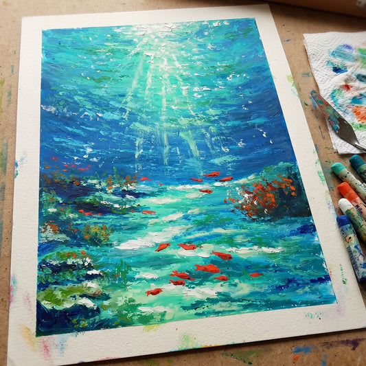 Handcrafted oil pastel painting of a sunlit underwater scene with orange fish and light beams through turquoise water.