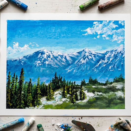Handcrafted oil pastel painting of a majestic mountain range with snowy peaks, a clear blue sky, and a green pine forest.